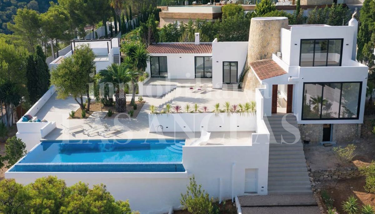 Ibiza west coast - Attractive villa with stone tower and beautiful sunset and sea views for sale