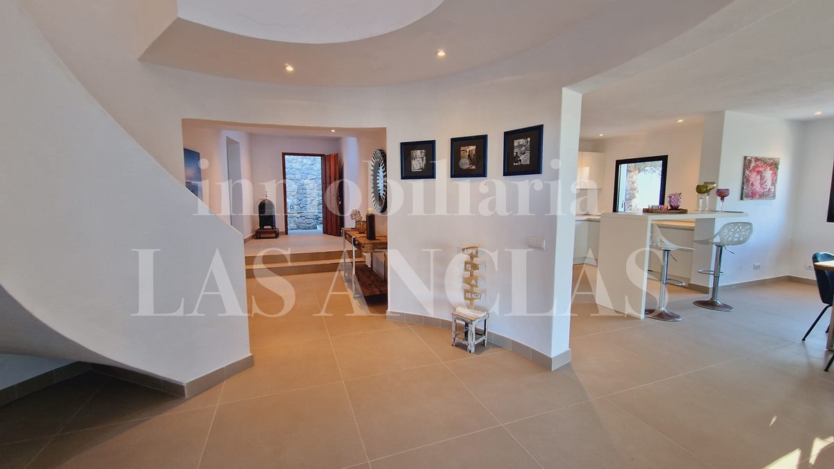 villa con torre de piedra natural en costa oeste Ibiza en venta