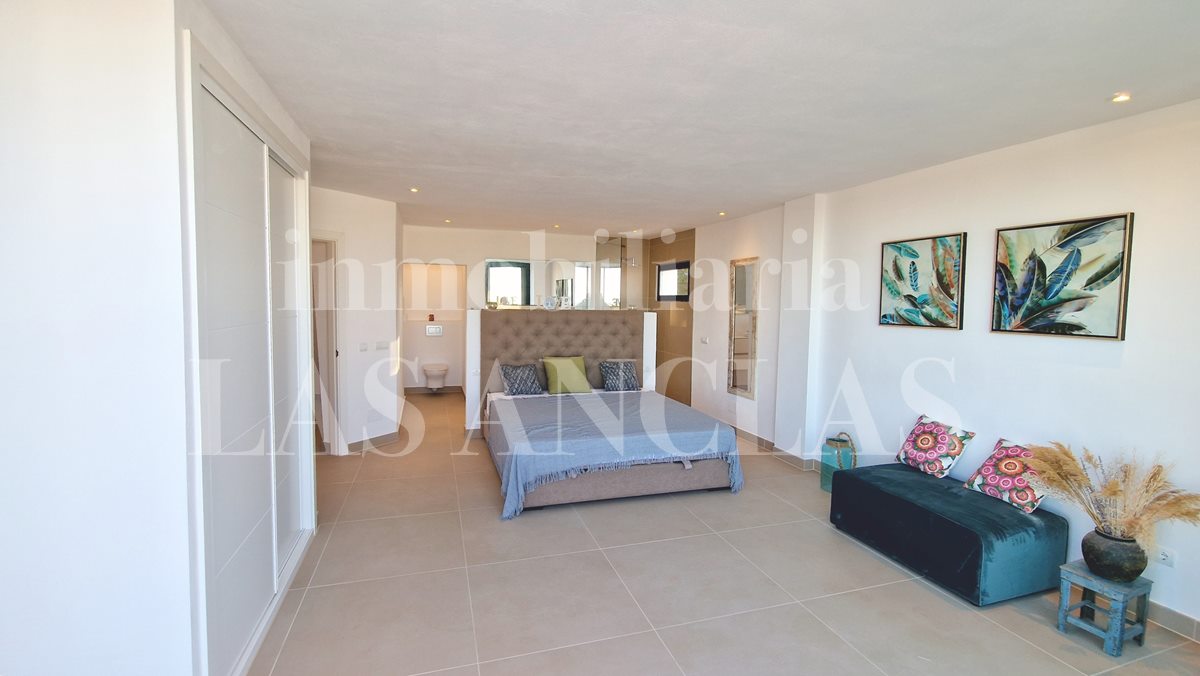 Ibiza West Coast - Renovated villa with stone tower and views to the sea and the coast for sale