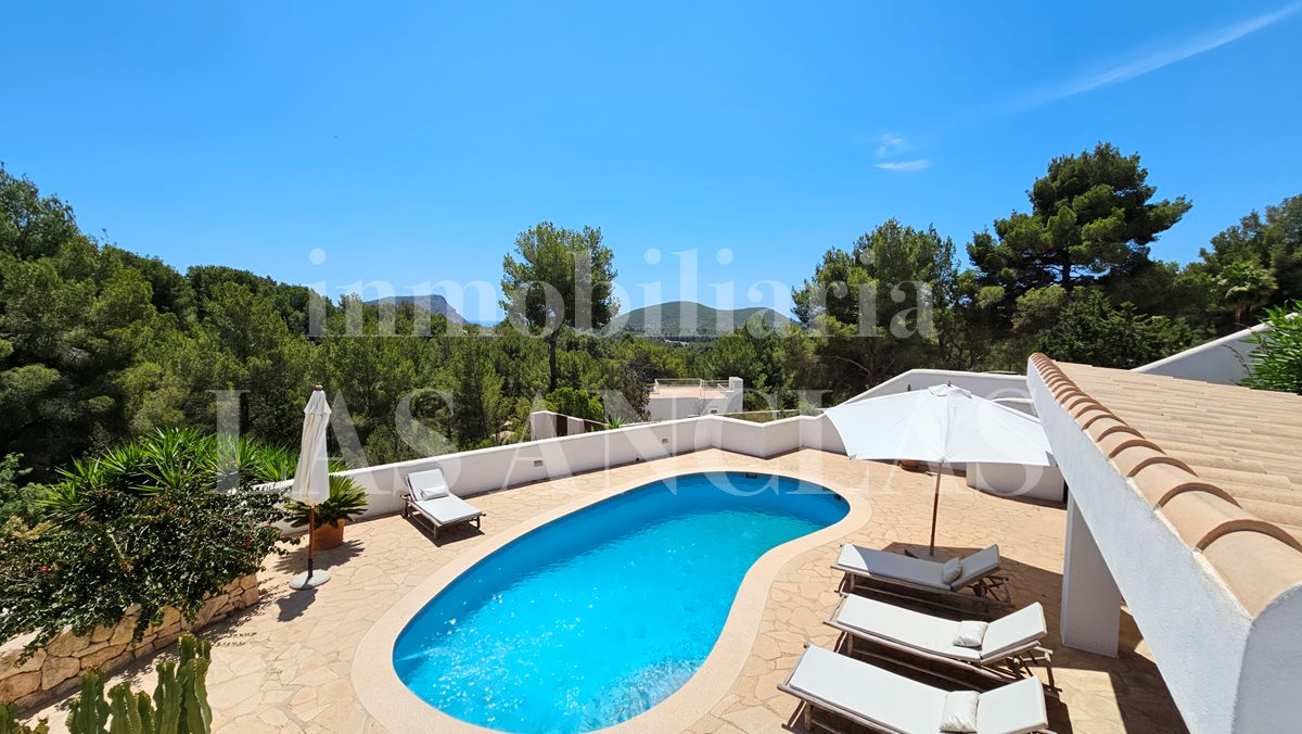  between Ibiza & Sta. Eulalia - Beautiful newly renovated villa with lots of charm in a quiet location and distant sea view for sale