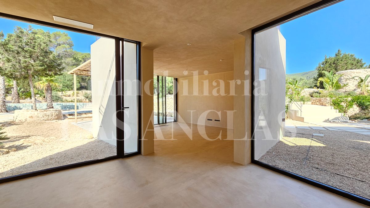 Ibiza San Carlos - Neubauvilla mit avantgardistischer Architektur und Blick auf die umliegende Landschaft im Verkauf